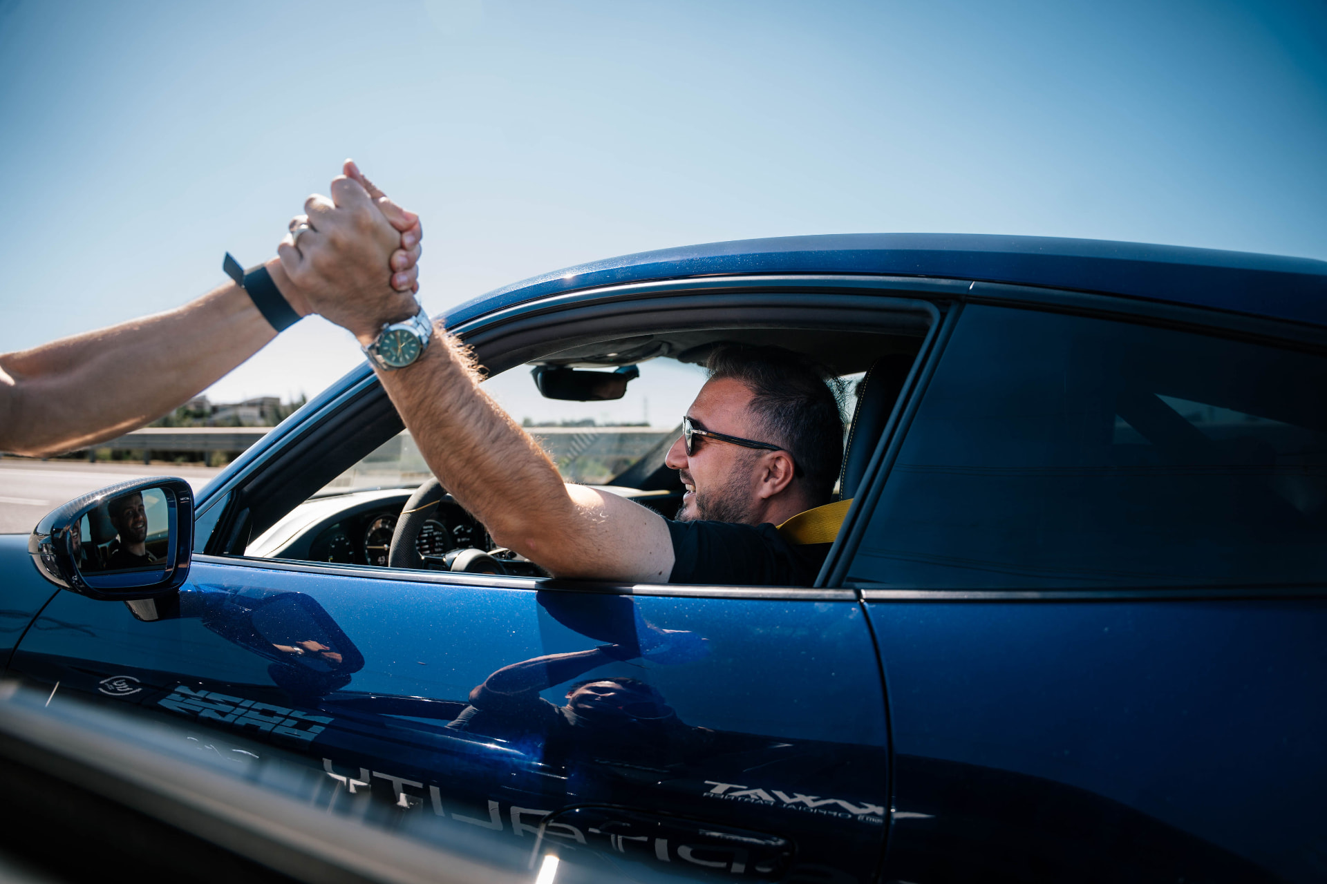 A high five from the driver's window
