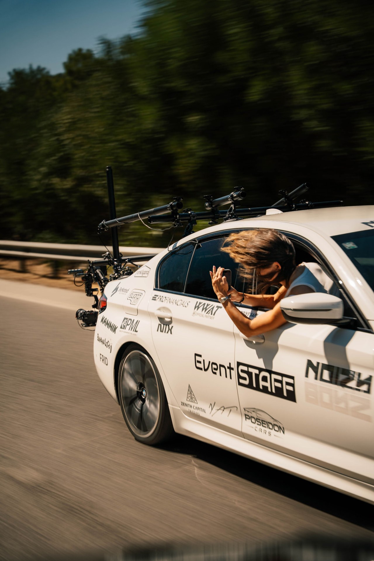 Filming from the event staff car