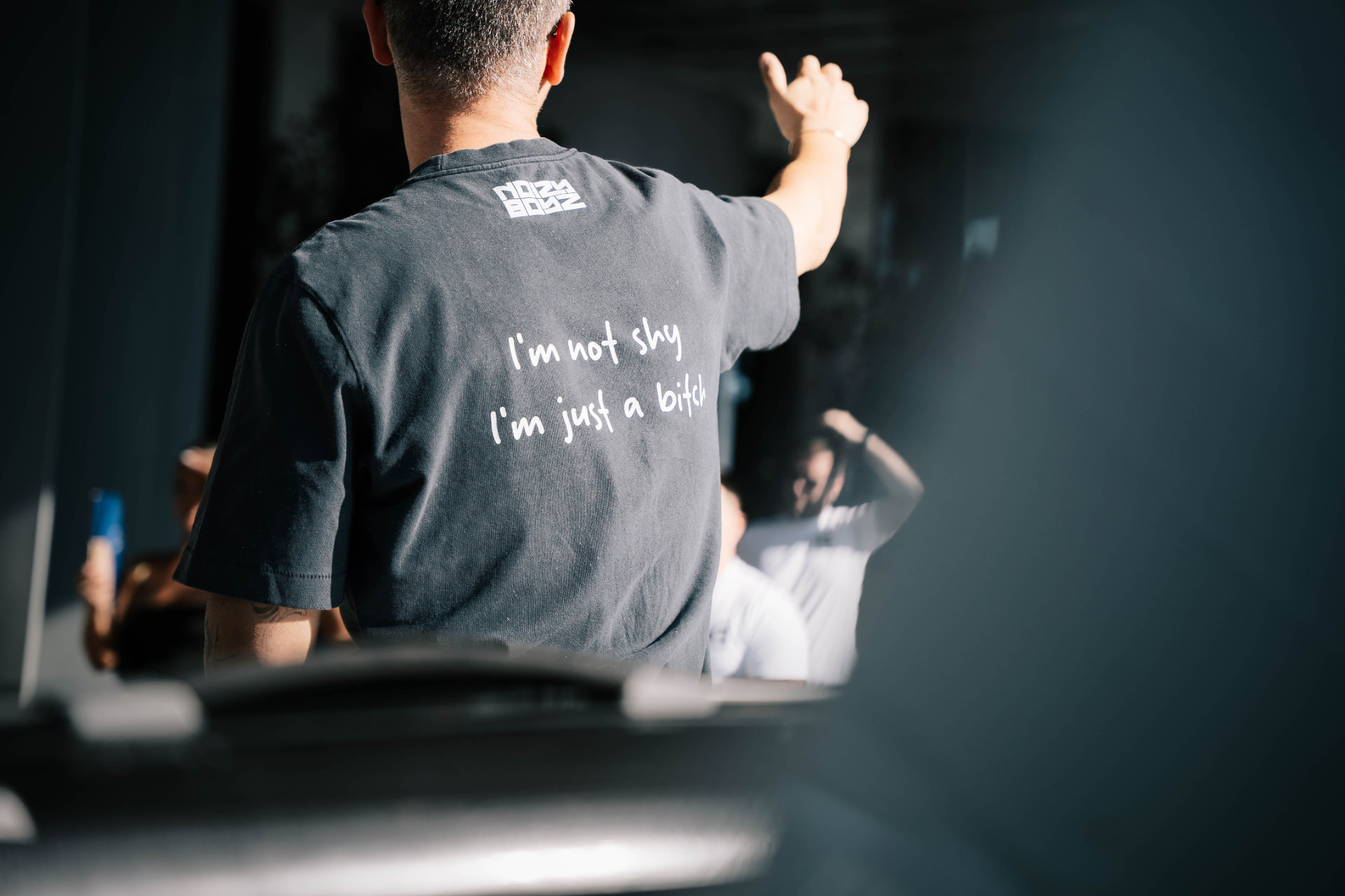 Black Noizy Boyz shirt reading I'm not shy, I'm just a bitch