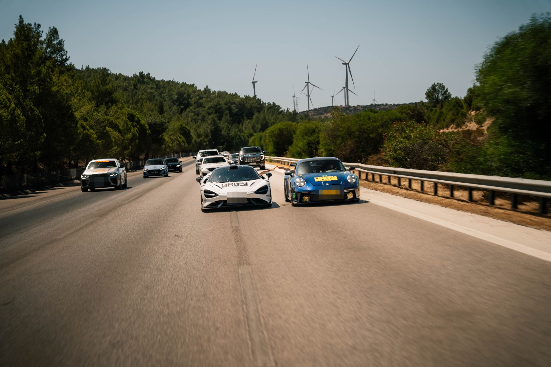 The convoy driving through the hills